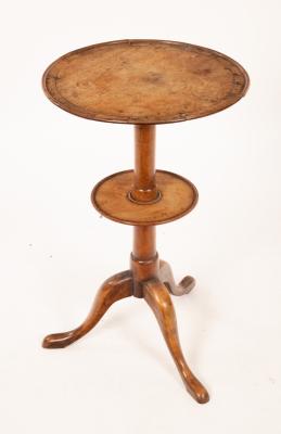 Appraisal: A mahogany two-tier tripod table cm diameter