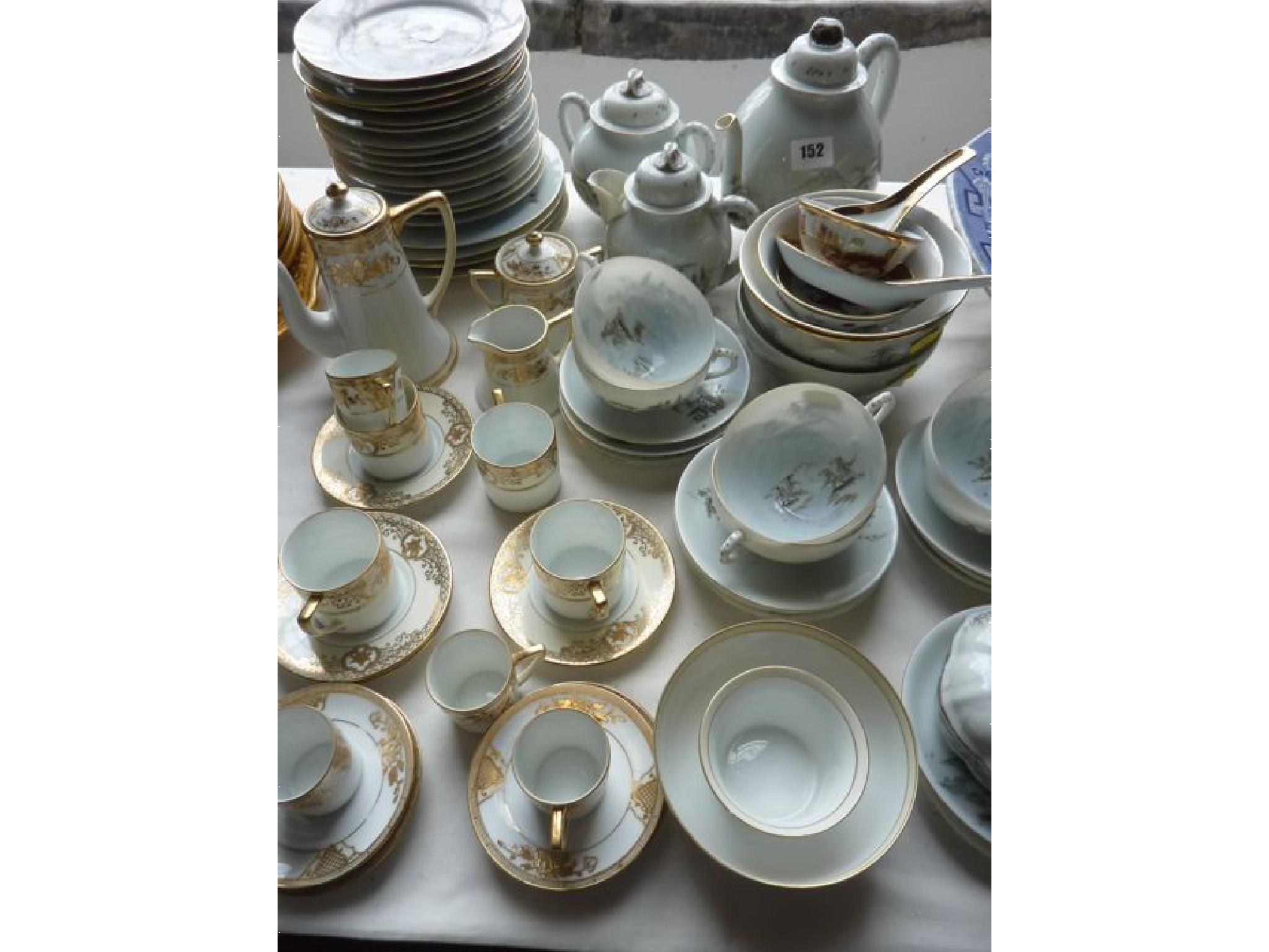 Appraisal: A Japanese Noritake part coffee service with gilded floral decoration