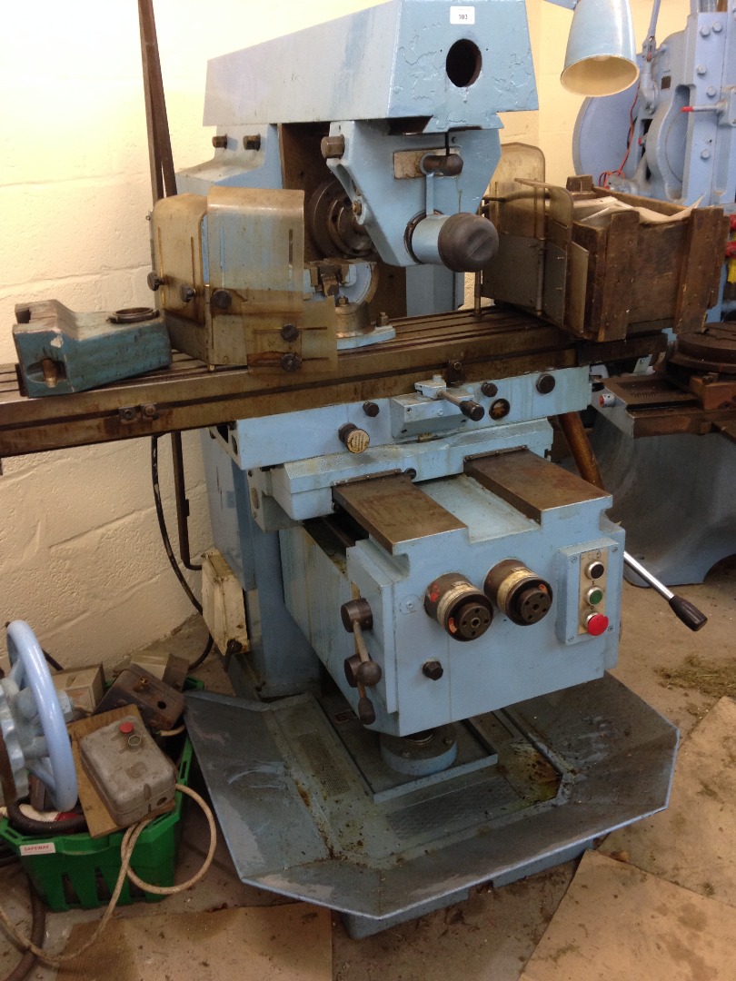 Appraisal: An Elliott horizontal milling machine shaper with tooling wall rack