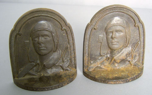 Appraisal: Pair of cast iron Aviator bookends depicting Charles Lindberg h