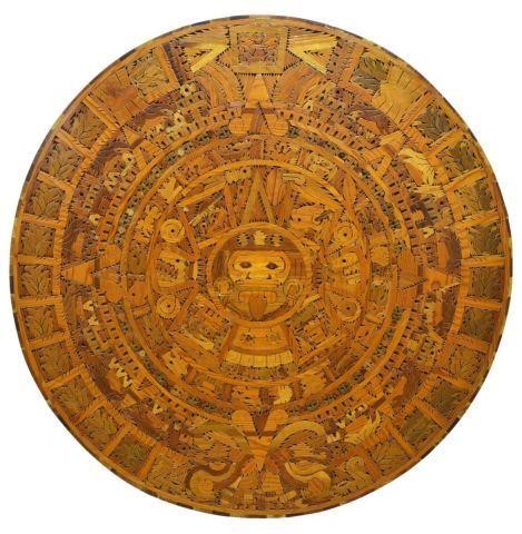 Appraisal: Mixed wood marquetry Aztec sun calendar Mexico th c reverse