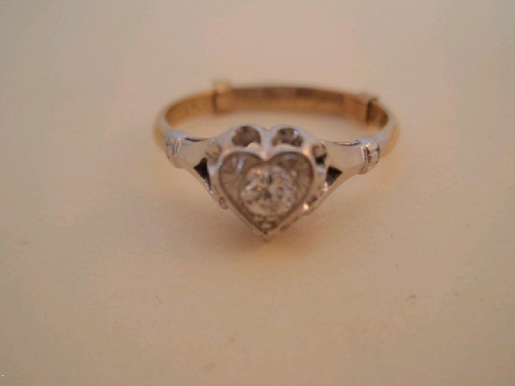 Appraisal: A solitaire diamond ring a round brilliant cut stone of