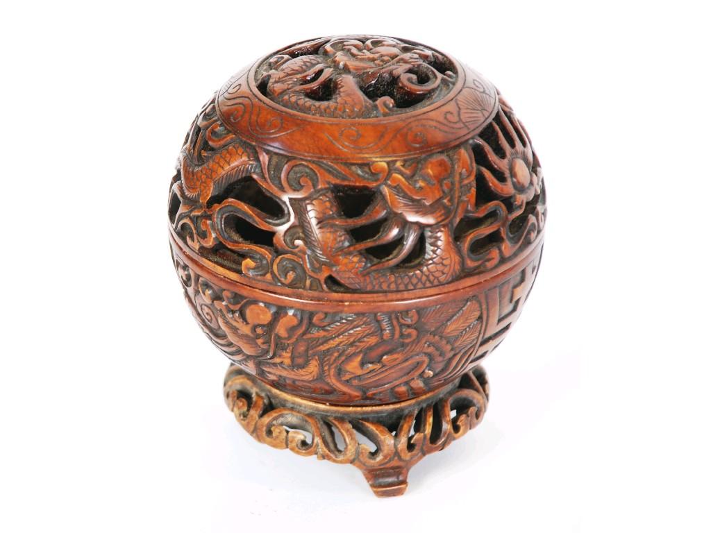 Appraisal: ORIENTAL CARVED AND PIERCED MOTTLED BROWN SOAPSTONE ORBICULAR TWO PART