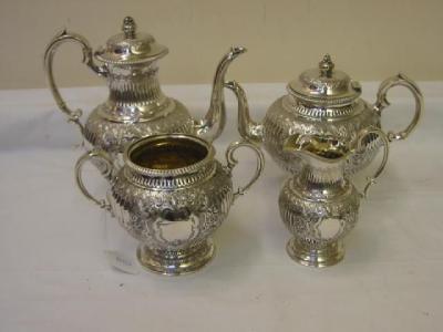 Appraisal: A VICTORIAN FOUR PIECE TEA SET of bellied form with