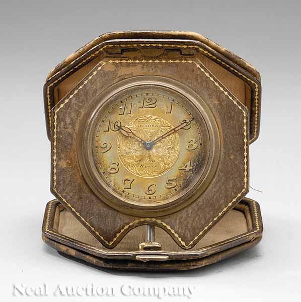 Appraisal: An Antique Swiss Eight-Day Travel Clock with Leather Case c