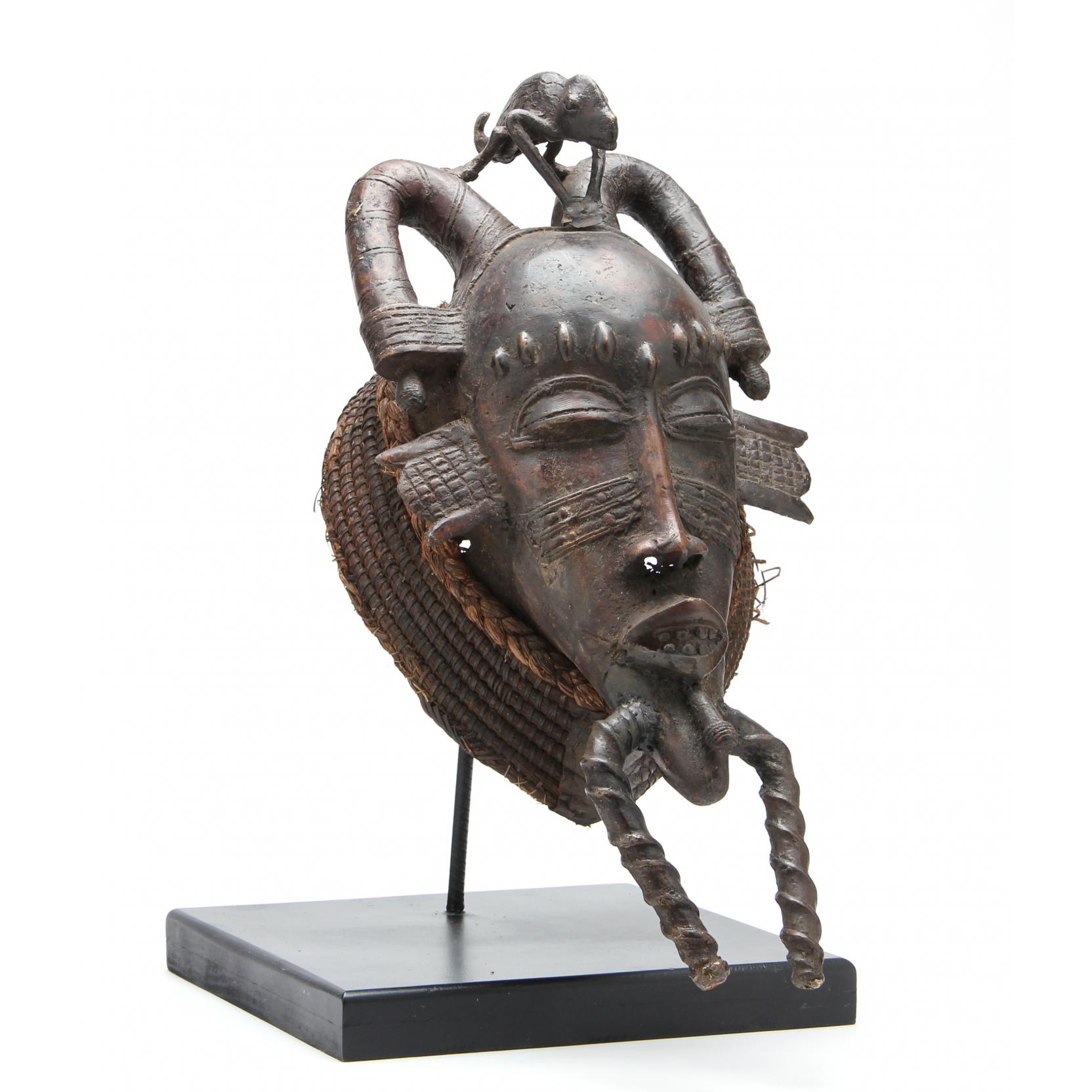 Appraisal: Ivory Coast or Mali Senufo Kpelie Mask bronze applied wicker