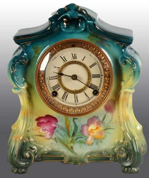 Appraisal: Ansonia China Clock Description In German case Marked La Blois