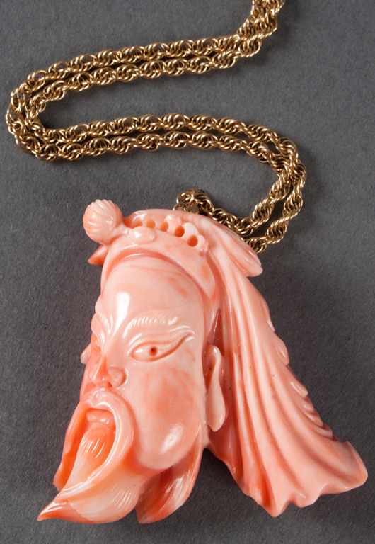 Appraisal: Chinese carved coral pendant with a K gold chain necklace