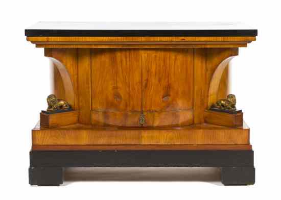 Appraisal: A Biedermeier Console Cabinet having a rectangular top over the