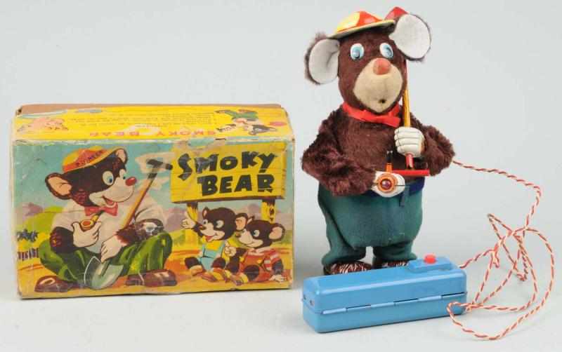 Appraisal: Tin Smoky Bear Battery-Operated Toy Description Japanese Working Remote control