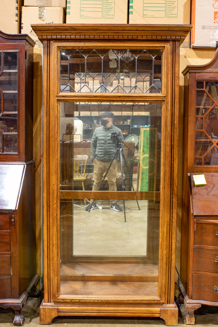 Appraisal: AMERICAN OAK CABINET American oak cabinet having a leaded glass