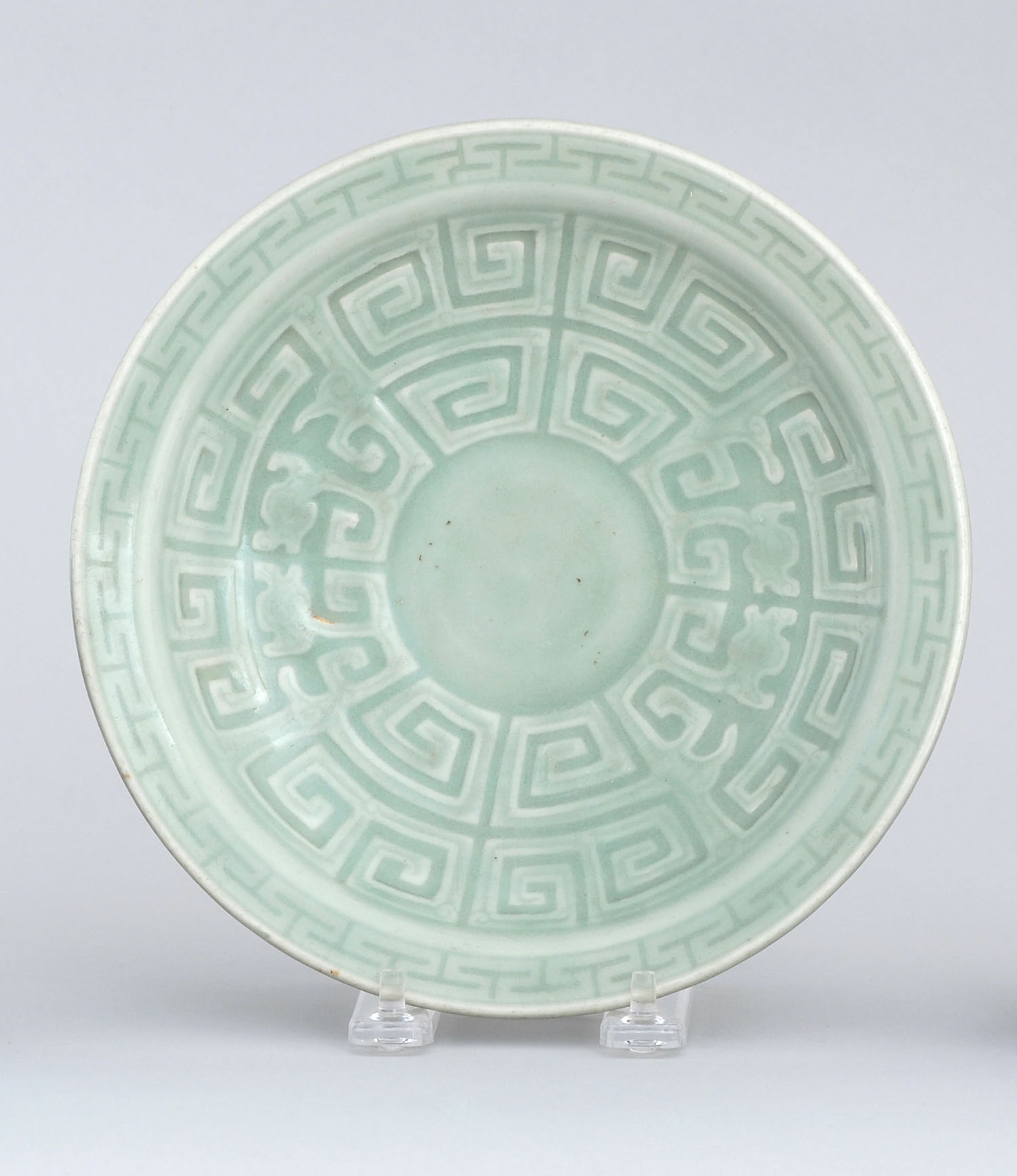 Appraisal: CELADON PORCELAIN PLATE Qianlong PeriodDecorated with stylized dragons Diameter cm