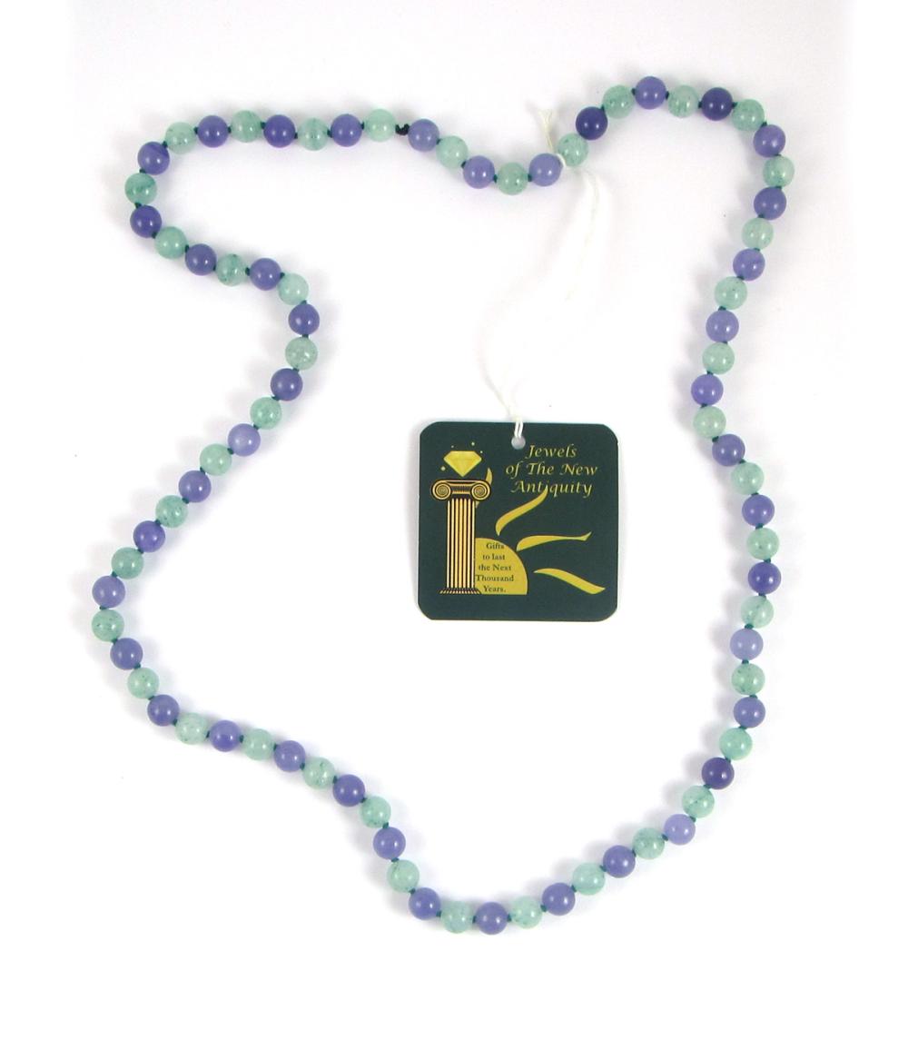 Appraisal: LAVENDER JADE AND AVENTURINE BEAD NECKLACE hand-knotted green silk with