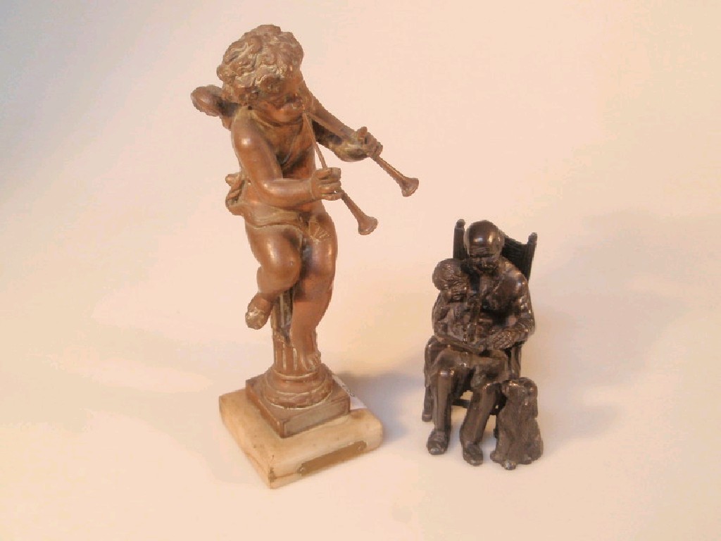 Appraisal: A thC French bronze figure of a winged cherub with