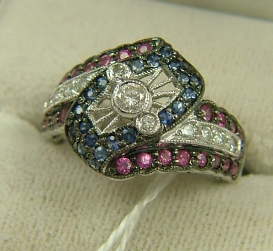 Appraisal: RUBY SAPPHIRE AND DIAMOND RING The K white gold band