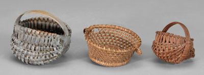 Appraisal: Three miniature baskets two oak split egg baskets one with