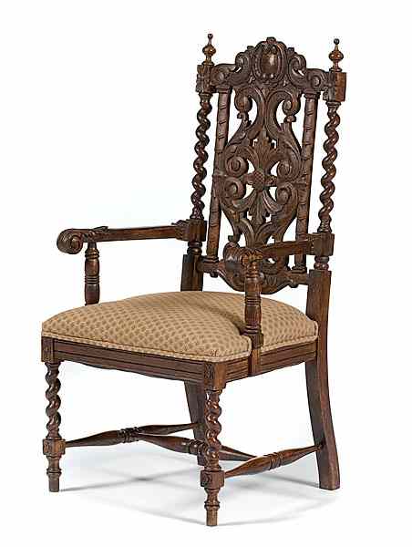 Appraisal: Tudor-style Carved Armchair Early th century A Tudor-style oak armchair