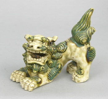 Appraisal: A Japanese Shishi Green glazed Shishi dog very ornate unmarked