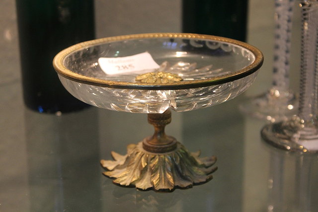 Appraisal: A GLASS AND GILT METAL MOUNTED SMALL TAZZA with star-cut