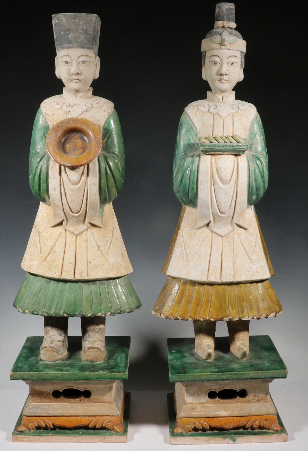 Appraisal: LARGE PR OF MING POTTERY TEMPLE FIGURES MALE FEMALE Three