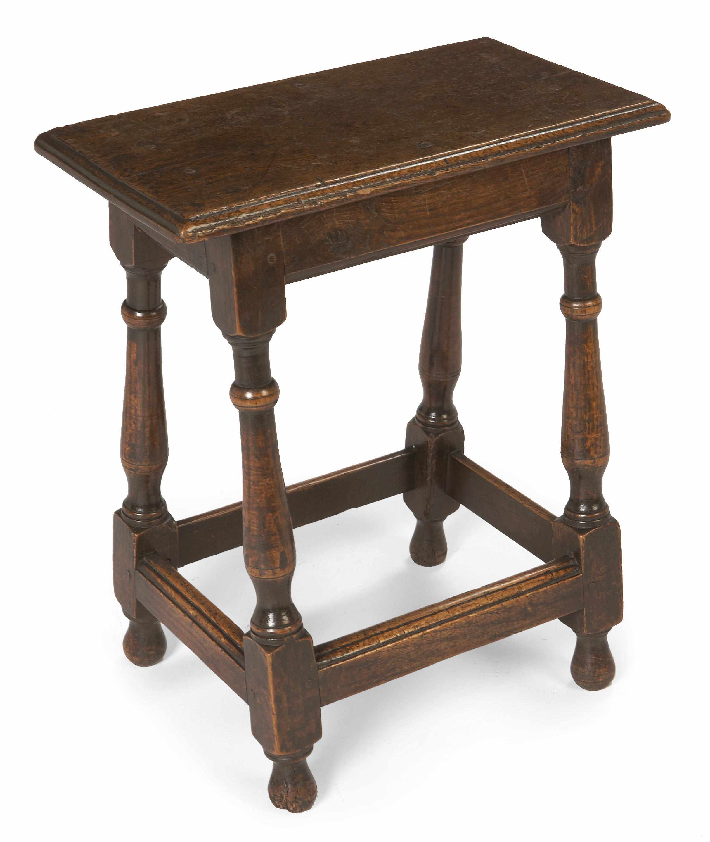 Appraisal: A Jacobean style carved oak stool height in width in