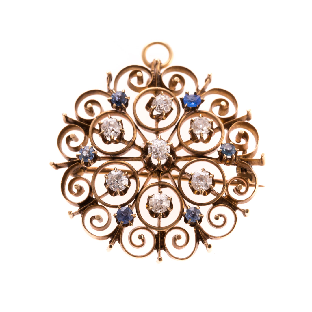 Appraisal: A Lady's Diamond Sapphire Pin Pendant K yellow gold brooch