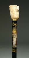 Appraisal: RARE AND SUPERB CARVED WOOLY MAMMOTH CANE DEPICTING MISHA THE