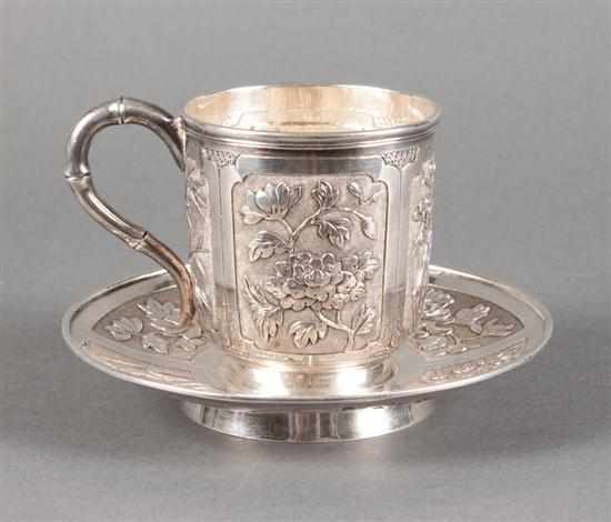 Appraisal: Chinese repousse silver cup and saucer marked ''MK'' and Chinese