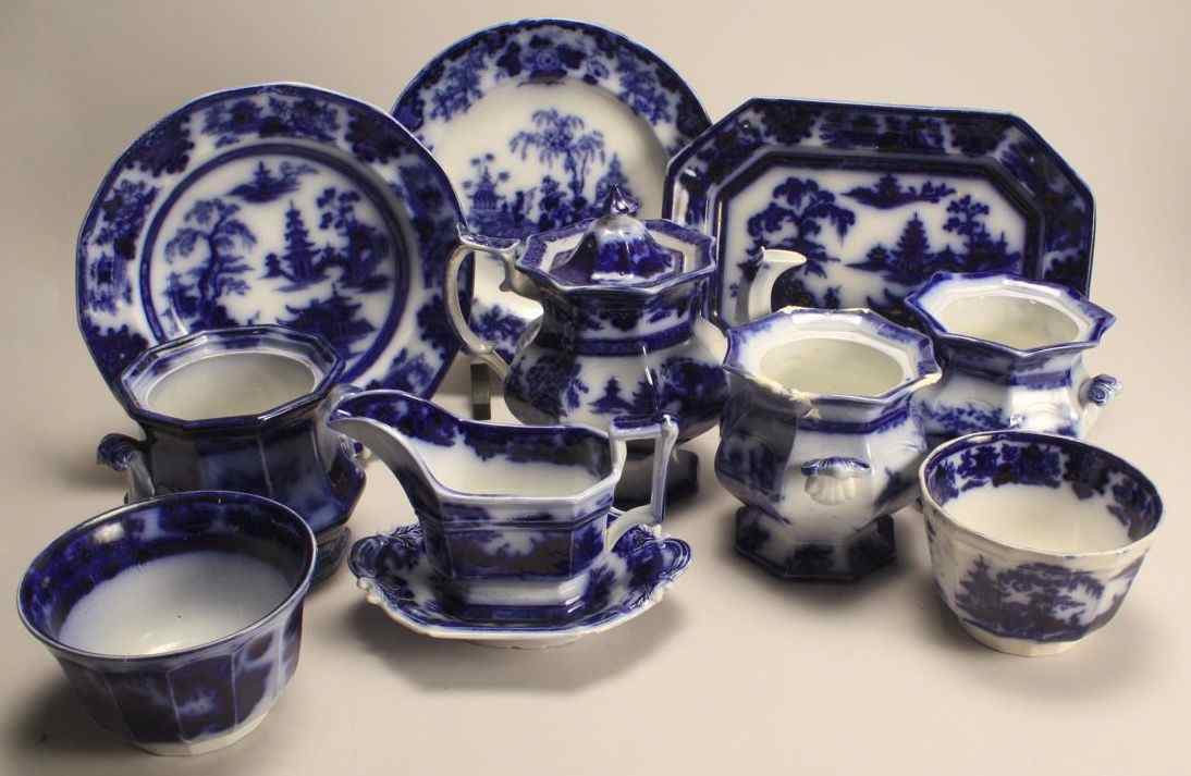 Appraisal: ELEVEN ASSORTED PIECES OF FLOW BLUE CHINAEnglish th CenturyThree sugar