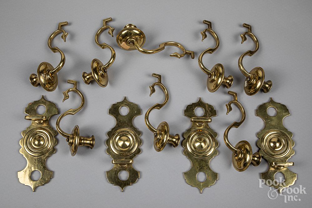 Appraisal: Set of four brass double arm wall sconces Set of