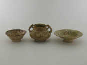 Appraisal: A group of three Kashan lustre pottery vessels Provenance part