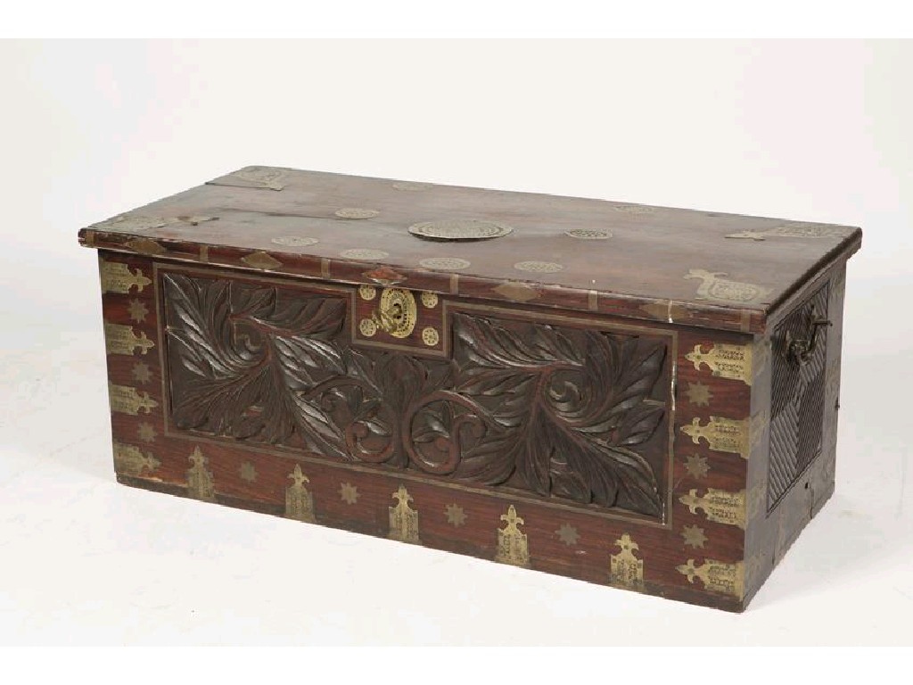 Appraisal: A TEAK AND BRASS BOUND TRAVELLING CHEST the rectangular top