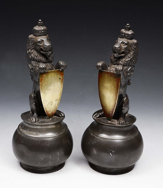 Appraisal: A PAIR OF VICTORIAN PEWTER SPOON WARMERS each in the