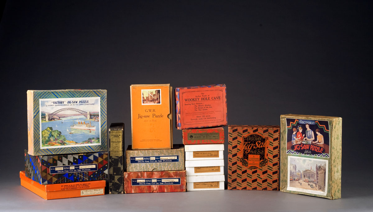 Appraisal: FOURTEEN ENGLISH VINTAGE JIGSAW PUZZLES IN ORIGINAL BOXES Please note