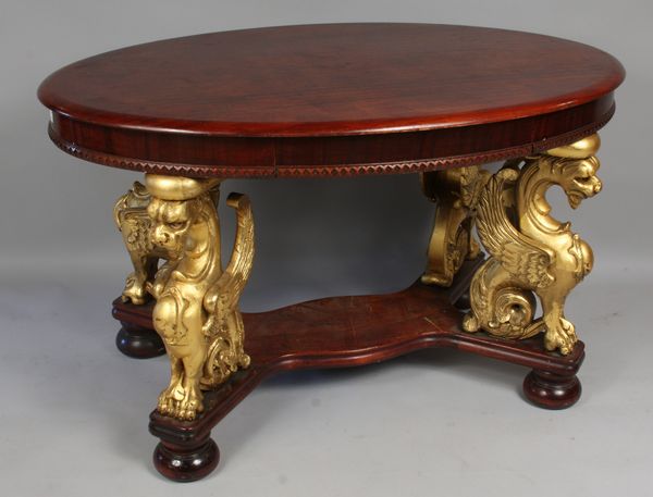 Appraisal: th Century oval mahogany parlor table having giltwood carved griffins