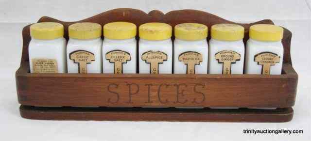 Appraisal: Antique Griffiths Spice Set with RackIncludes milk glass spice jars