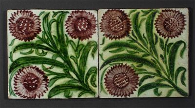 Appraisal: A pair of William De Morgan tiles each painted with