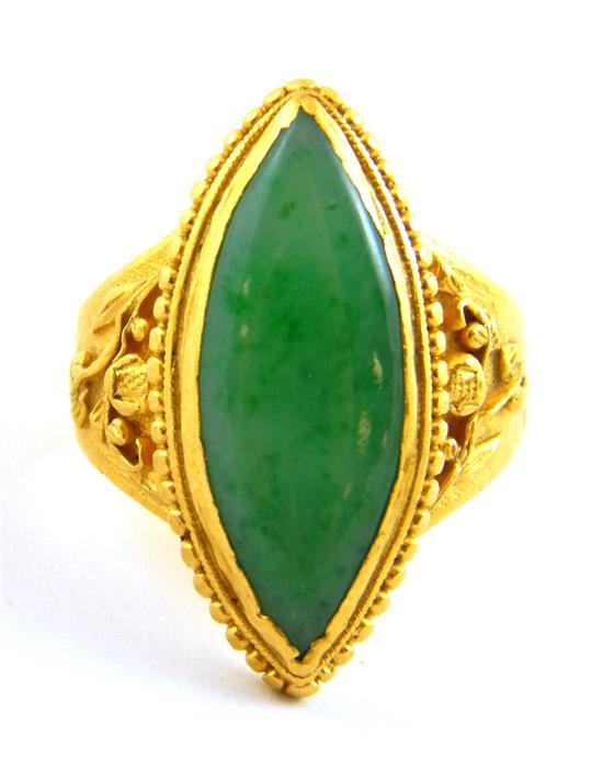 Appraisal: JEWELRY Jade ring tested K yellow gold bezel set with