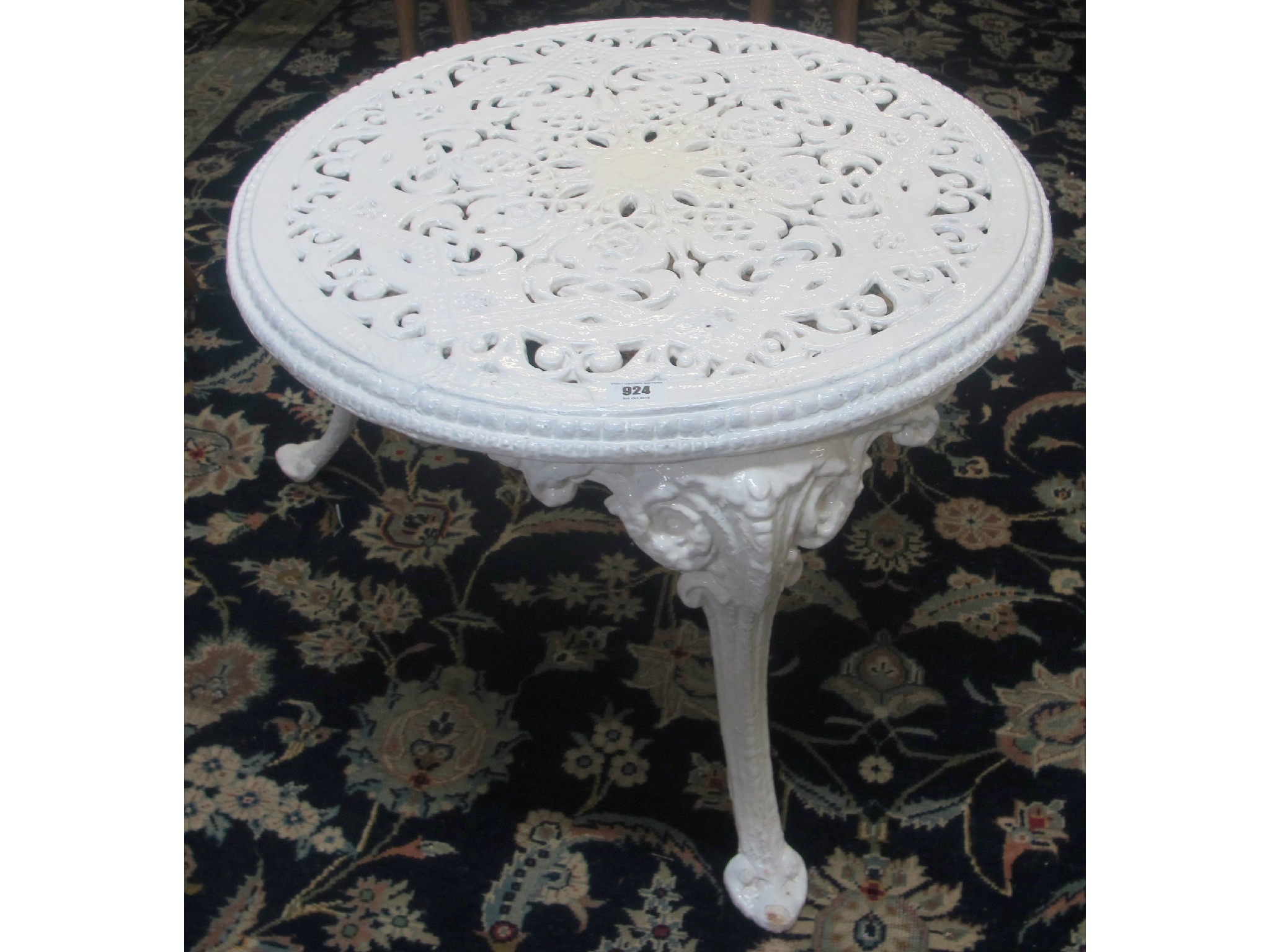 Appraisal: A cast iron painted garden table