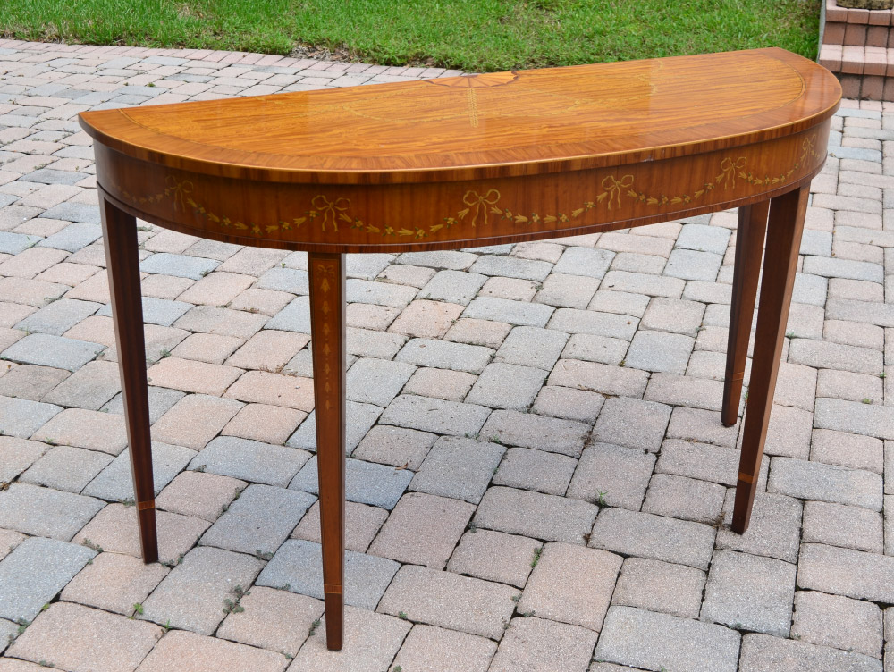 Appraisal: HERITAGE HEIRLOOM INLAID CONSOLE TABLE Elongated curved top with banded