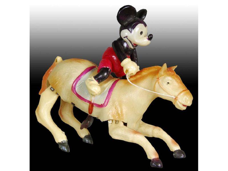 Appraisal: Walt Disney Celluloid Mickey Mouse Riding Horse Wi Description ''