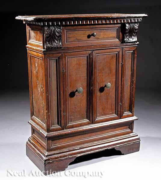 Appraisal: An Antique Italian Renaissance-Style Carved Walnut Commode th c dentil-molded