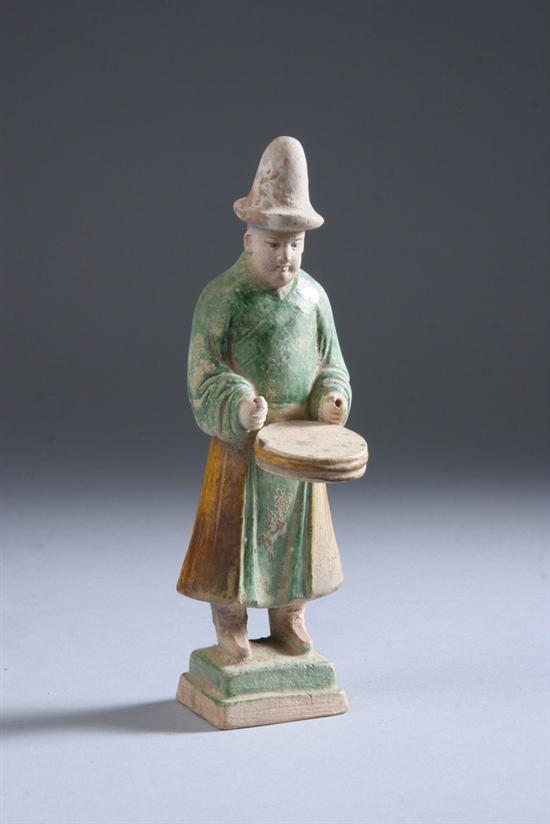 Appraisal: CHINESE GLAZED POTTERY FIGURE OF DRUMMER Ming Dynasty - in