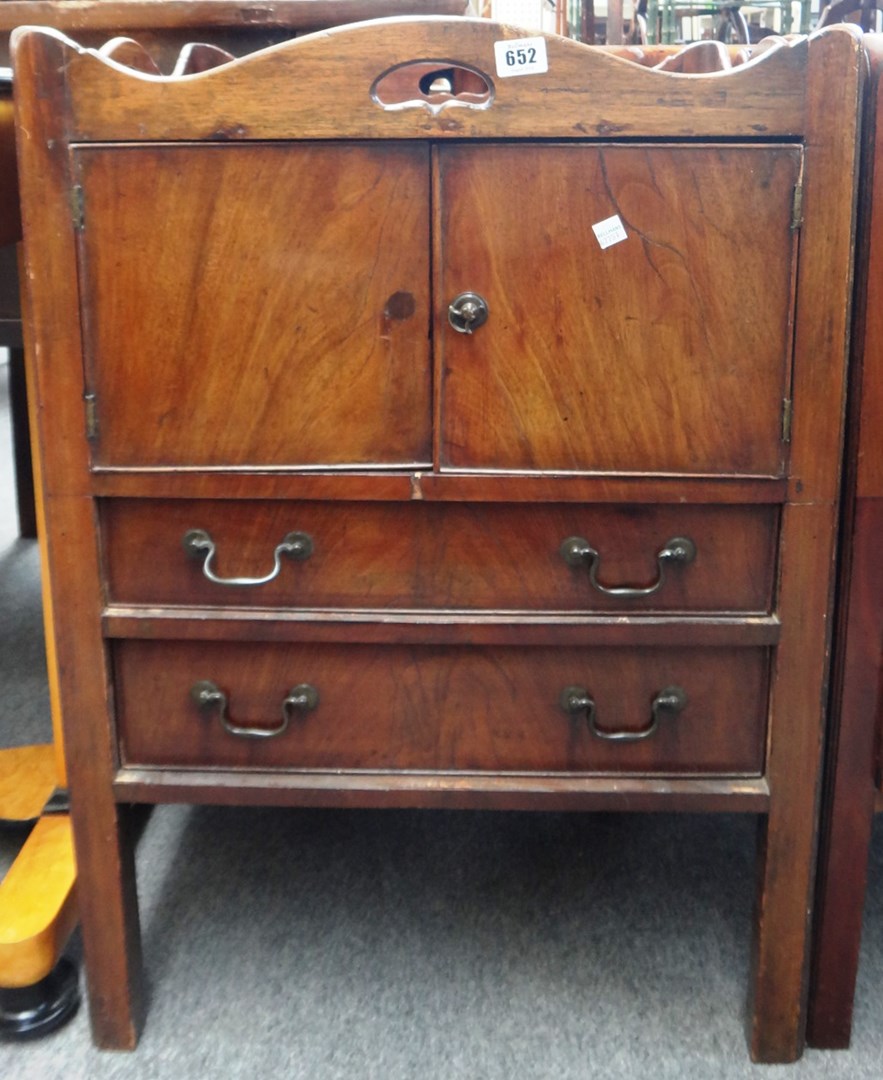 Appraisal: A George III mahogany tray top night commode with a