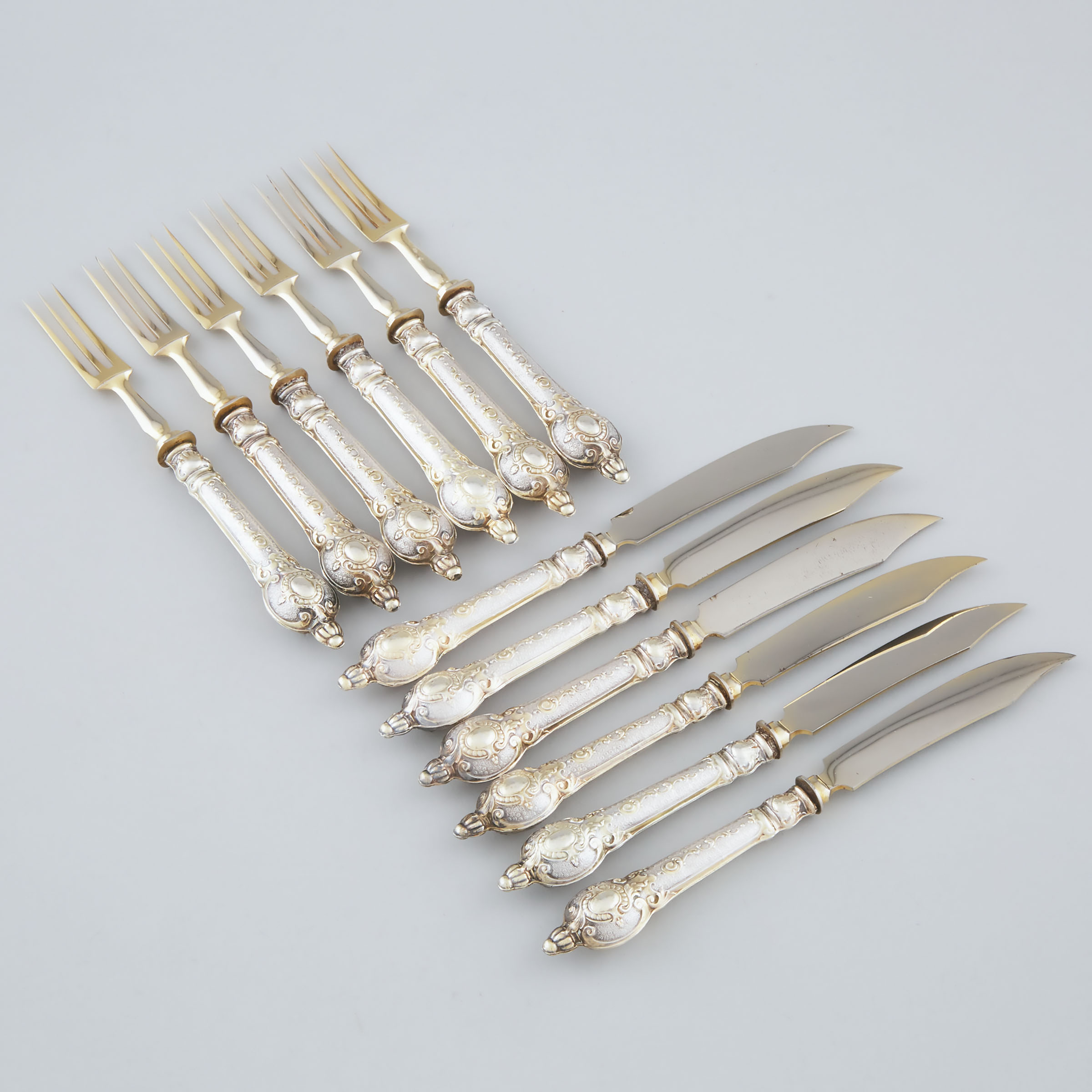 Appraisal: Six German Silver-Gilt Handled Fruit Knives and Six Forks c