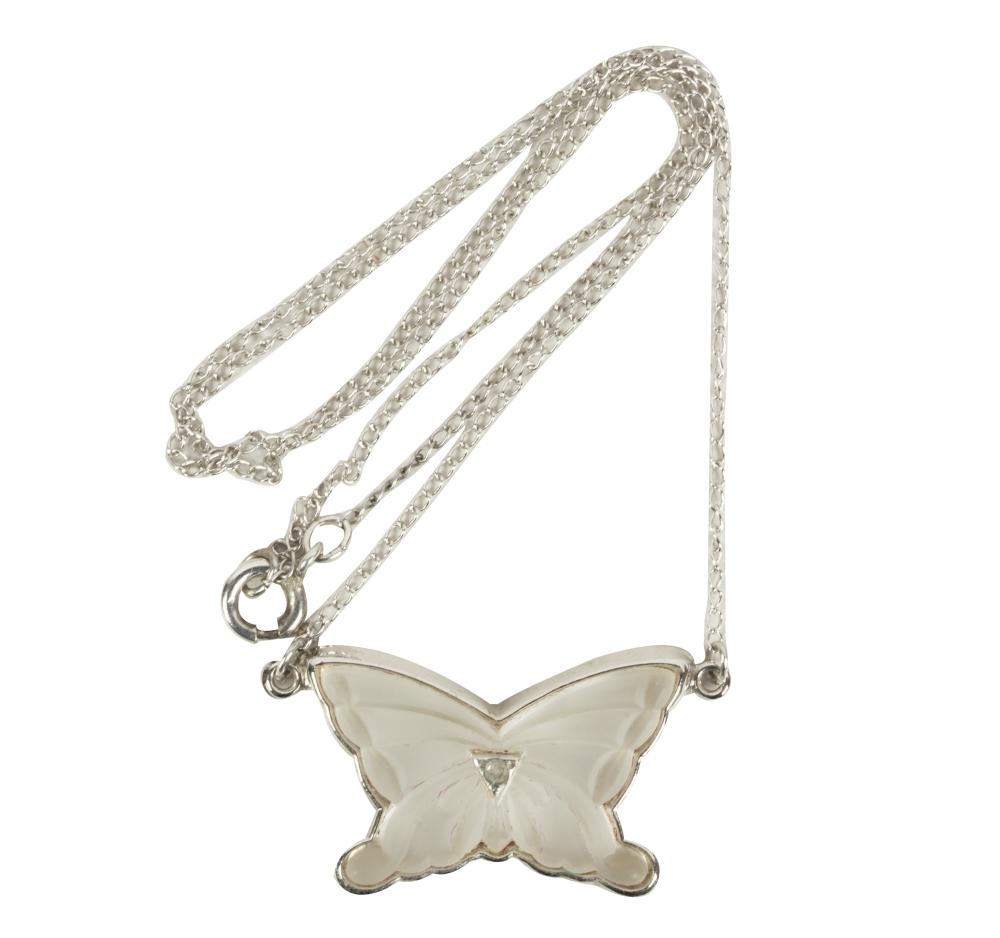 Appraisal: ROCK CRYSTAL DIAMOND BUTTERFLY NECKLACEcontaining one carved rock crystal measuring