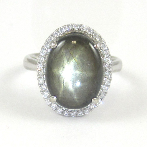 Appraisal: BLACK STAR SAPPHIRE AND DIAMOND RING k white gold with