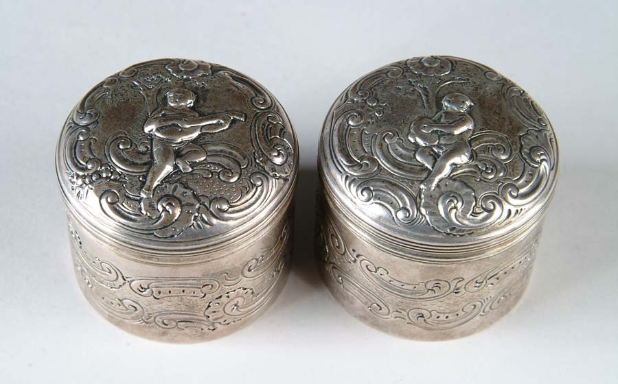 Appraisal: PAIR OF SILVER BOXES Wonderful pair of boxes has chased