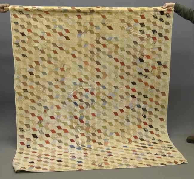 Appraisal: th c tumbling blocks quilt