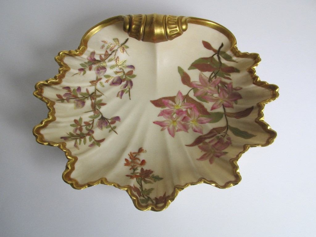 Appraisal: A Royal Worcester blush porcelain shell shaped dish painted with